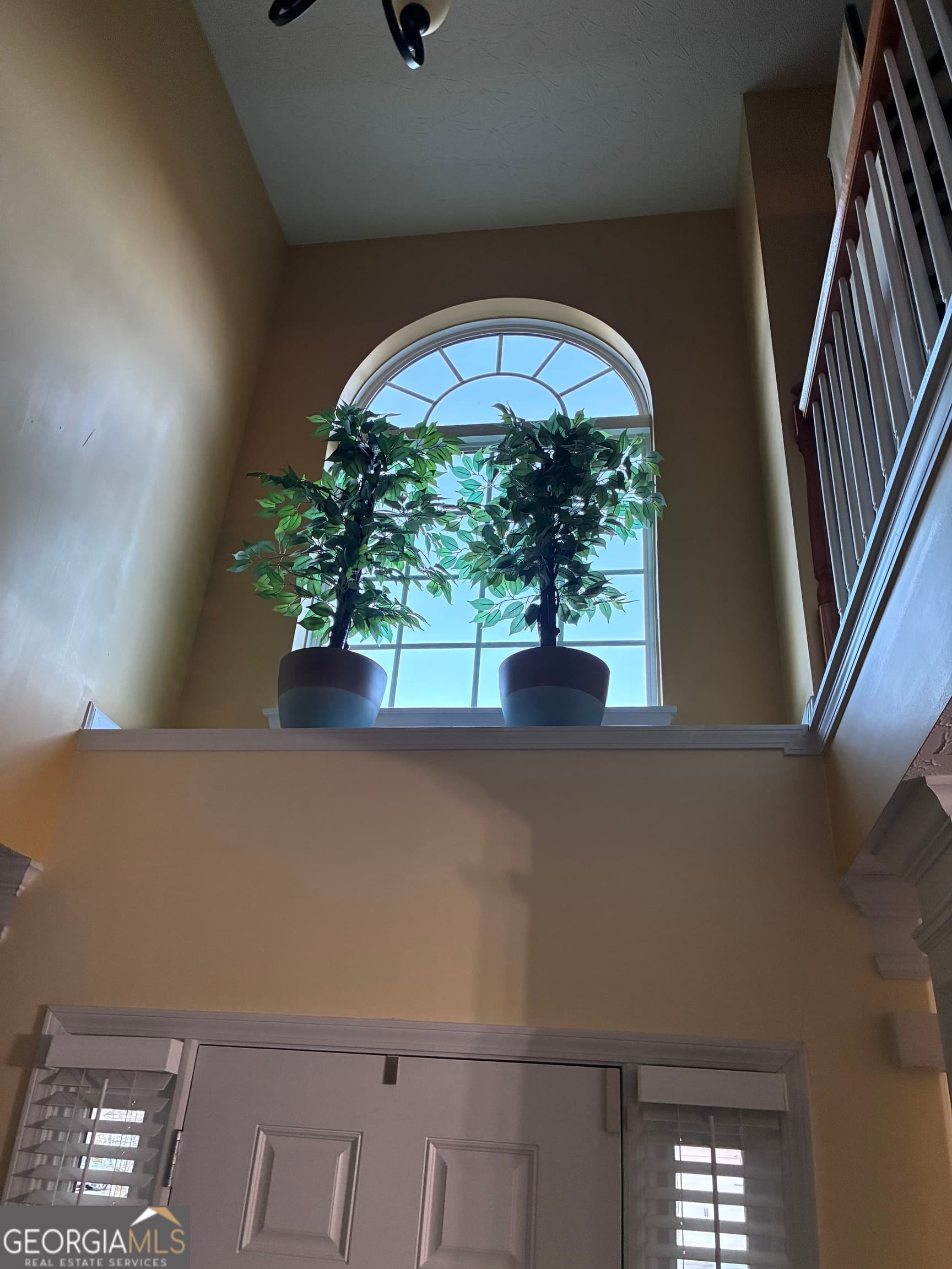 6 bedroom, 4 bathroom, 3,910 sq ft single family residence for sale at 4323 Grove Lake Street, Loganville, GA 30052 — photo 2