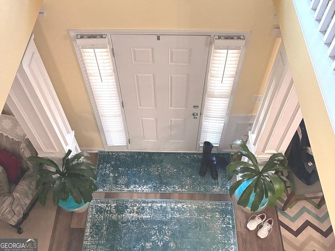 6 bedroom, 4 bathroom, 3,910 sq ft single family residence for sale at 4323 Grove Lake Street, Loganville, GA 30052 — photo 3