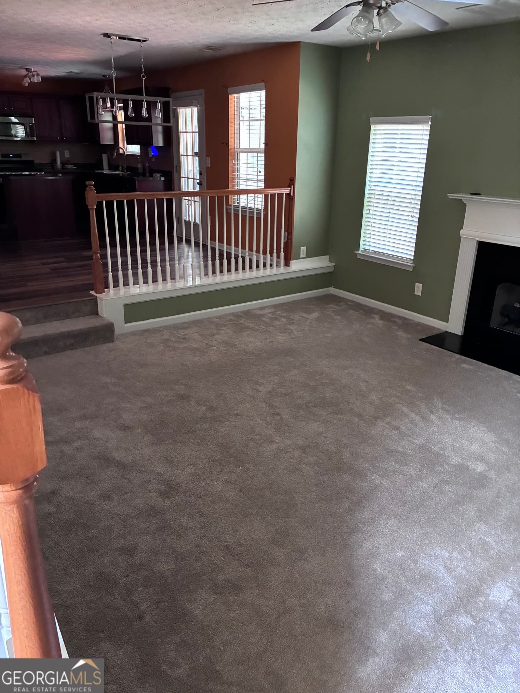 6 bedroom, 4 bathroom, 3,910 sq ft single family residence for sale at 4323 Grove Lake Street, Loganville, GA 30052 — photo 5