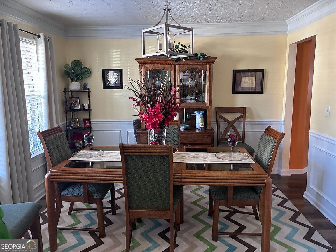 6 bedroom, 4 bathroom, 3,910 sq ft single family residence for sale at 4323 Grove Lake Street, Loganville, GA 30052 — photo 4