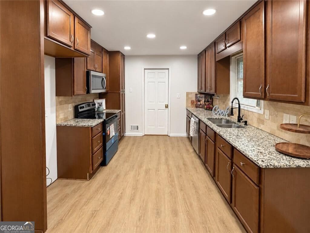 4 bedroom, 3 bathroom, 3,513 sq ft single family residence for sale at 177 Northwind Court, Lilburn, GA 30047 — photo 9