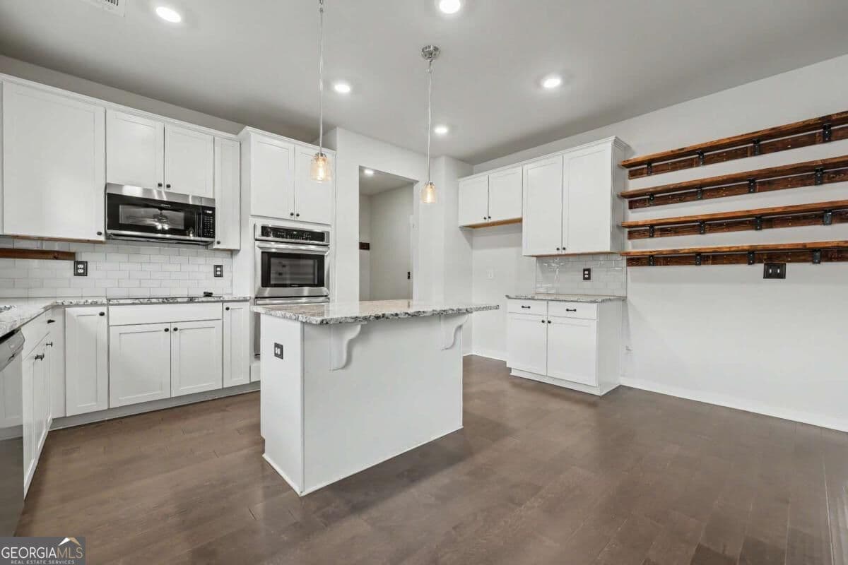 4 bedroom, 3 bathroom, 2,207 sq ft single family residence for sale at 1328 Woods Lane, Jefferson, GA 30549 — photo 8