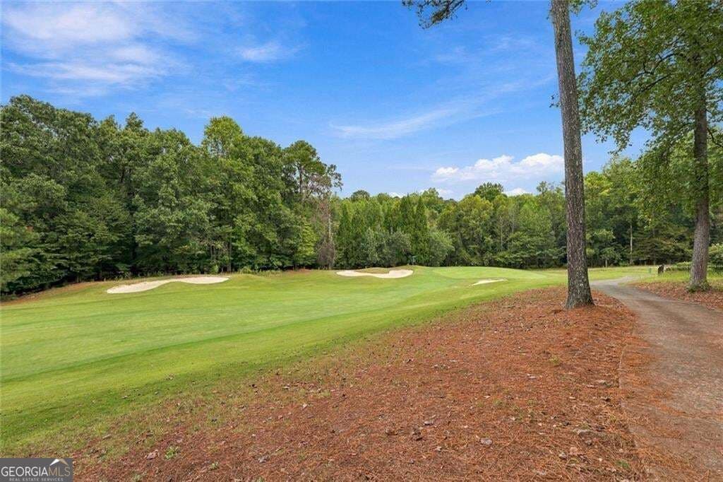 6 bedroom, 5 bathroom, 4,789 sq ft single family residence for sale at 1327 Bridge Mill Avenue, Canton, GA 30114 — photo 6