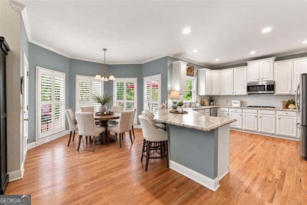 6 bedroom, 5 bathroom, 4,789 sq ft single family residence for sale at 1327 Bridge Mill Avenue, Canton, GA 30114 — photo 9