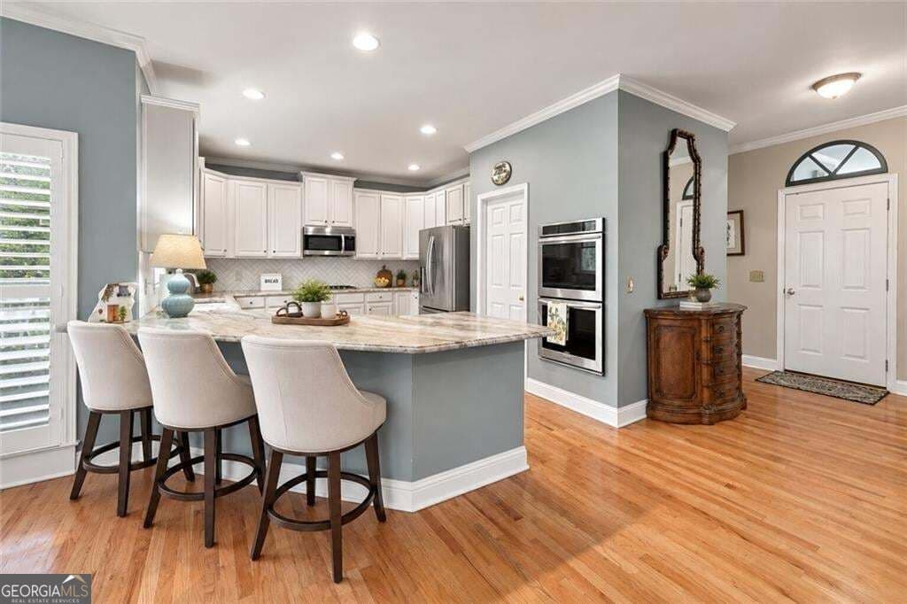 6 bedroom, 5 bathroom, 4,789 sq ft single family residence for sale at 1327 Bridge Mill Avenue, Canton, GA 30114 — photo 10