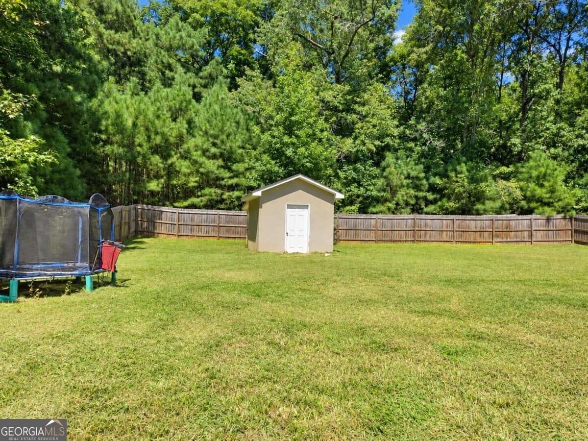 3 bedroom, 2 bathroom, 2,020 sq ft single family residence for sale at 6050 Dorsett Shoals Road, Douglasville, GA 30135 — photo 4