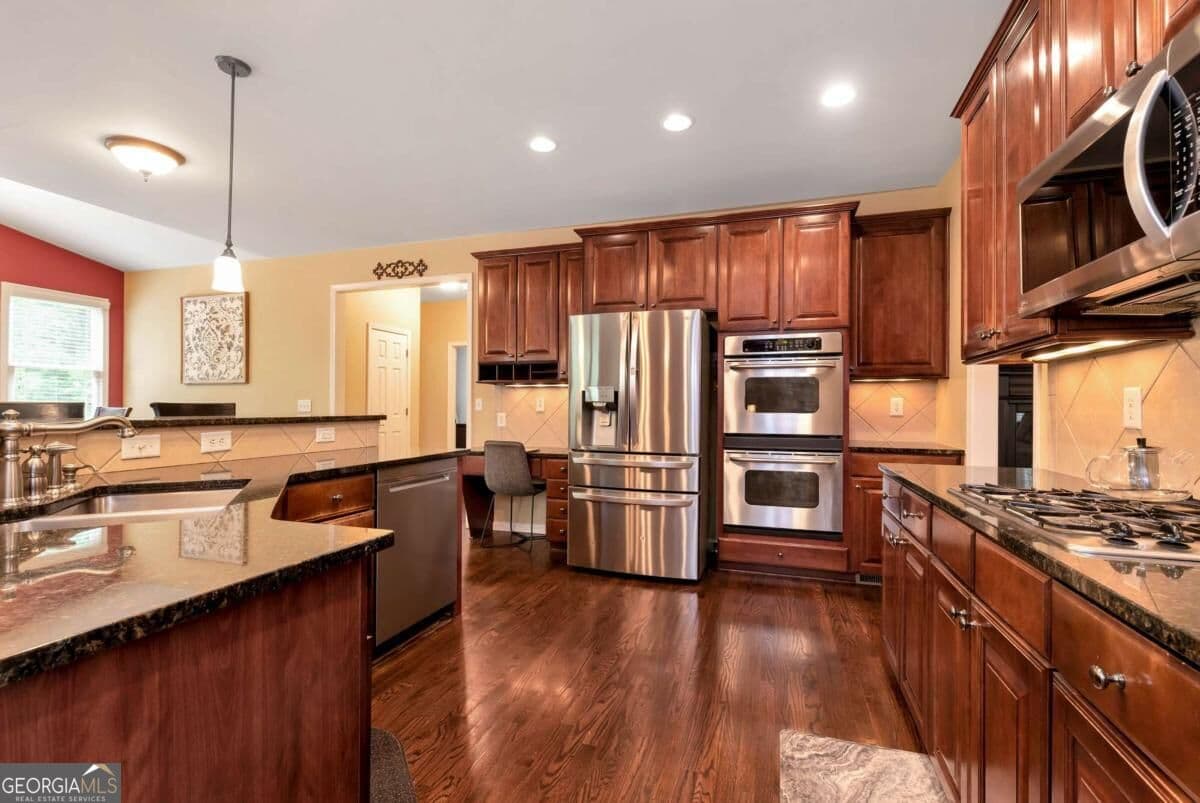 5 bedroom, 4 bathroom, 3,211 sq ft single family residence for sale at 4755 Trilogy Park Trail, Hoschton, GA 30548 — photo 8