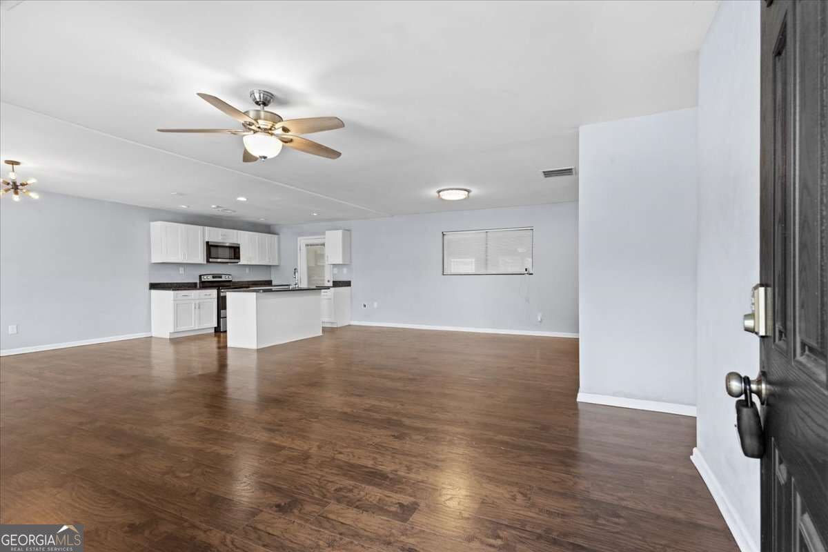 4 bedroom, 3 bathroom, 1,940 sq ft single family residence for sale at 255 Hummingbird Way, Riverdale, GA 30274 — photo 7