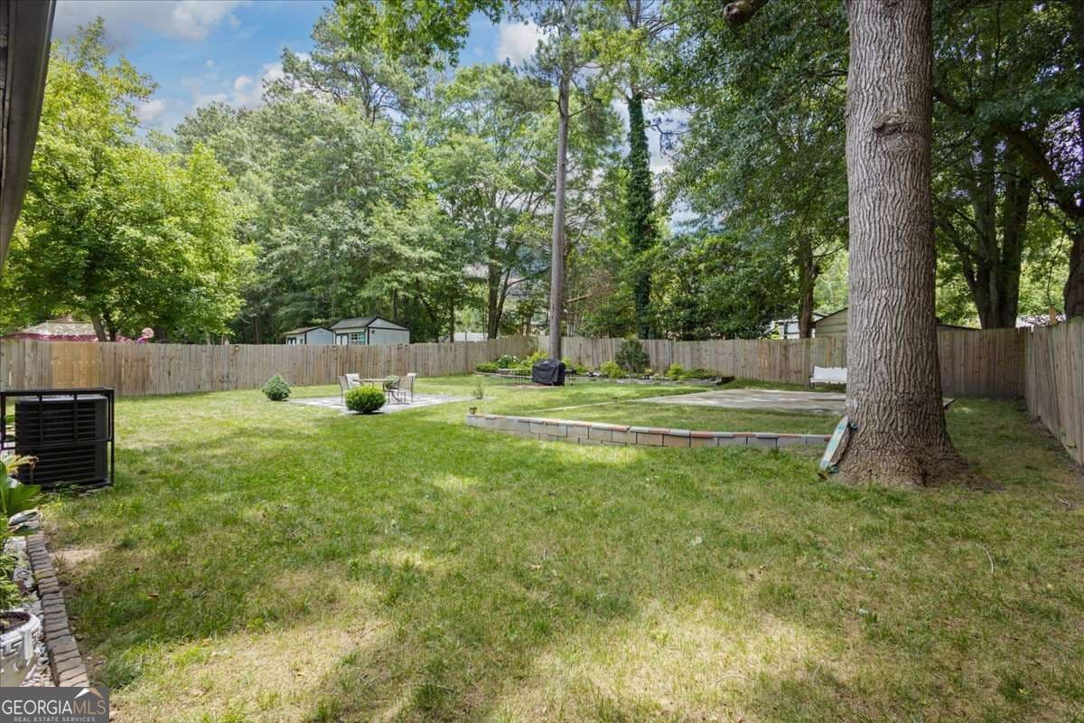 4 bedroom, 3 bathroom, 1,940 sq ft single family residence for sale at 255 Hummingbird Way, Riverdale, GA 30274 — photo 9