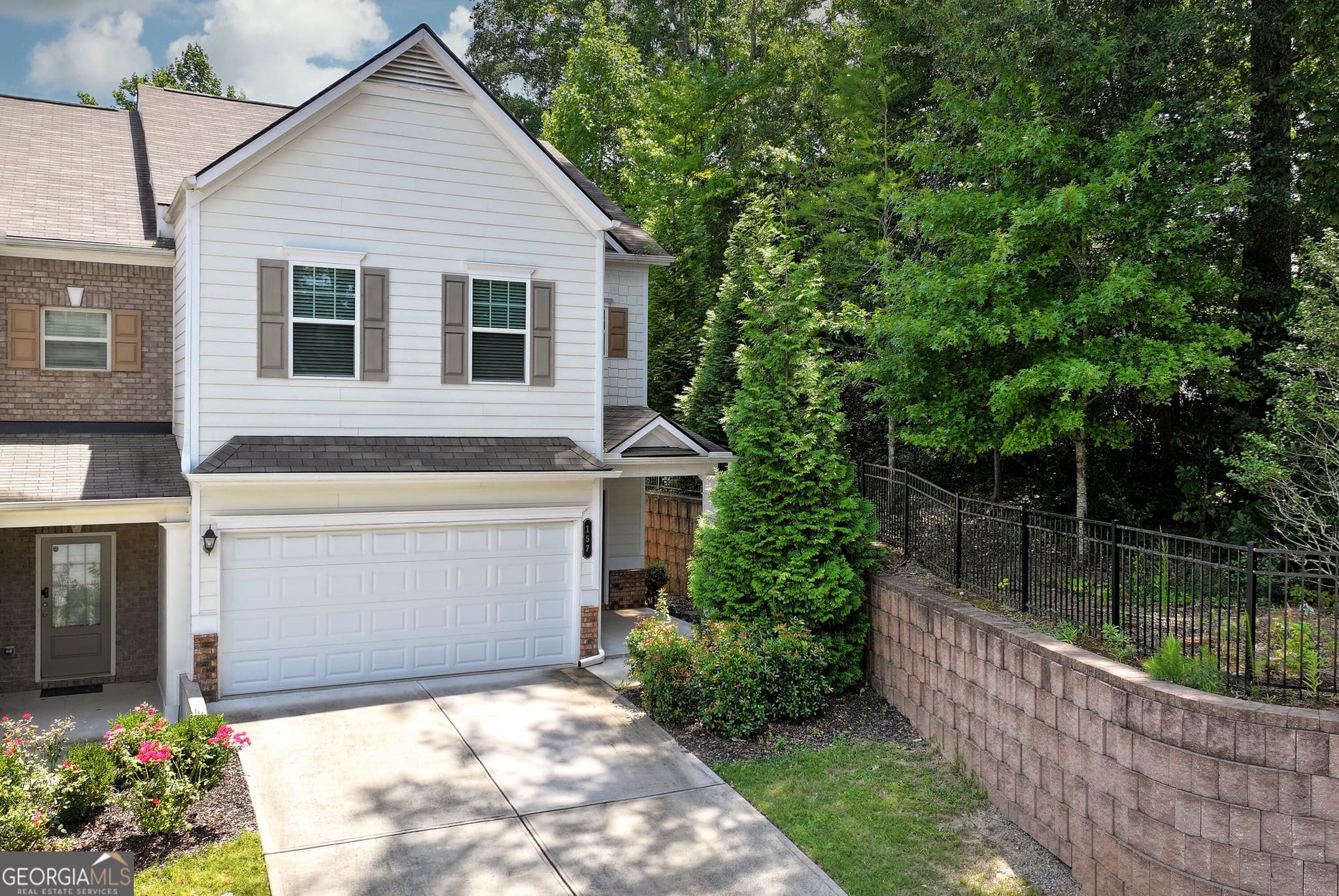 3 bedroom, 2.5 bathroom, 2,094 sq ft townhouse for sale at 157 Inman Drive, Canton, GA 30114 — photo 1 of 43