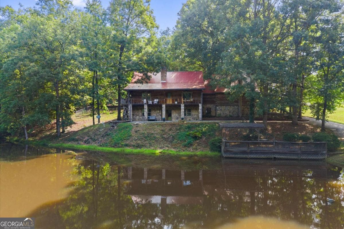 3 bedroom, 3 bathroom, 3,720 sq ft cabin,single family residence for sale at 140 J R Road, Cartersville, GA 30121 — photo 2