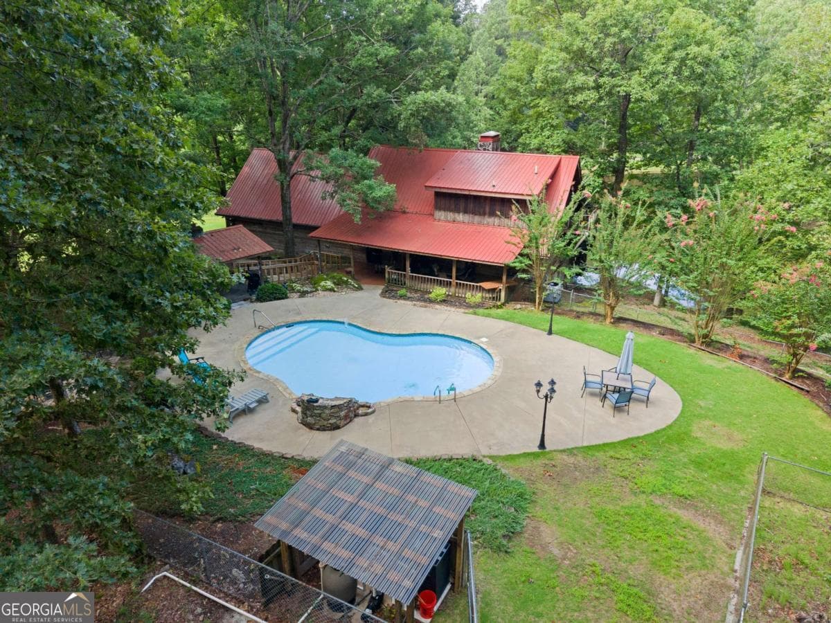 3 bedroom, 3 bathroom, 3,720 sq ft cabin,single family residence for sale at 140 J R Road, Cartersville, GA 30121 — photo 3