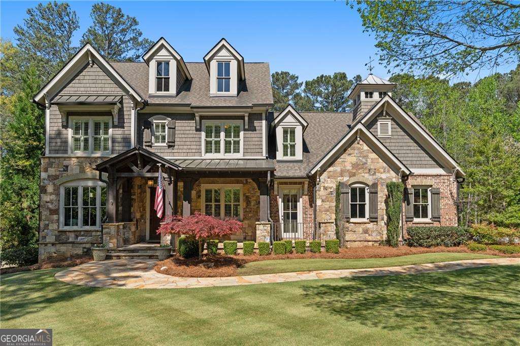 7 bedroom, 7 bathroom, 8,621 sq ft single family residence for sale at 4388 Lochsa Lane, Suwanee, GA 30024 — photo 3