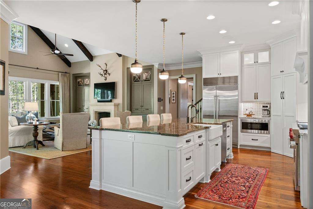 7 bedroom, 7 bathroom, 8,621 sq ft single family residence for sale at 4388 Lochsa Lane, Suwanee, GA 30024 — photo 4