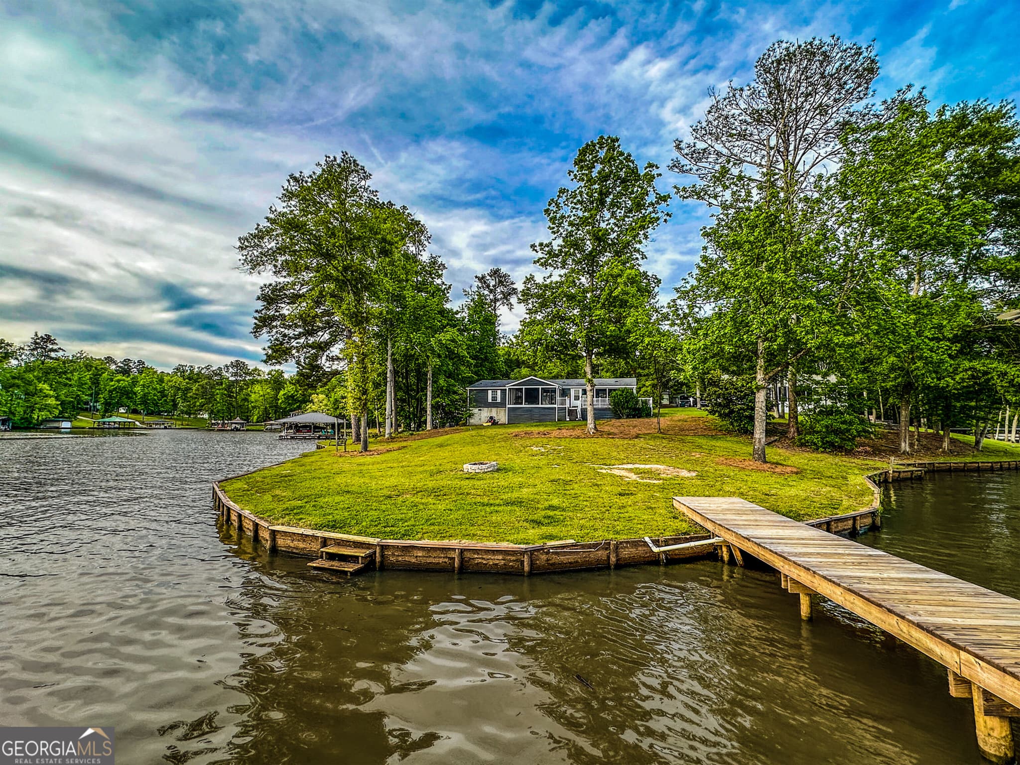 4 bedroom, 2 bathroom, 2,261 sq ft manufactured home,single family residence for sale at 112 Little River Court, Eatonton, GA 31024