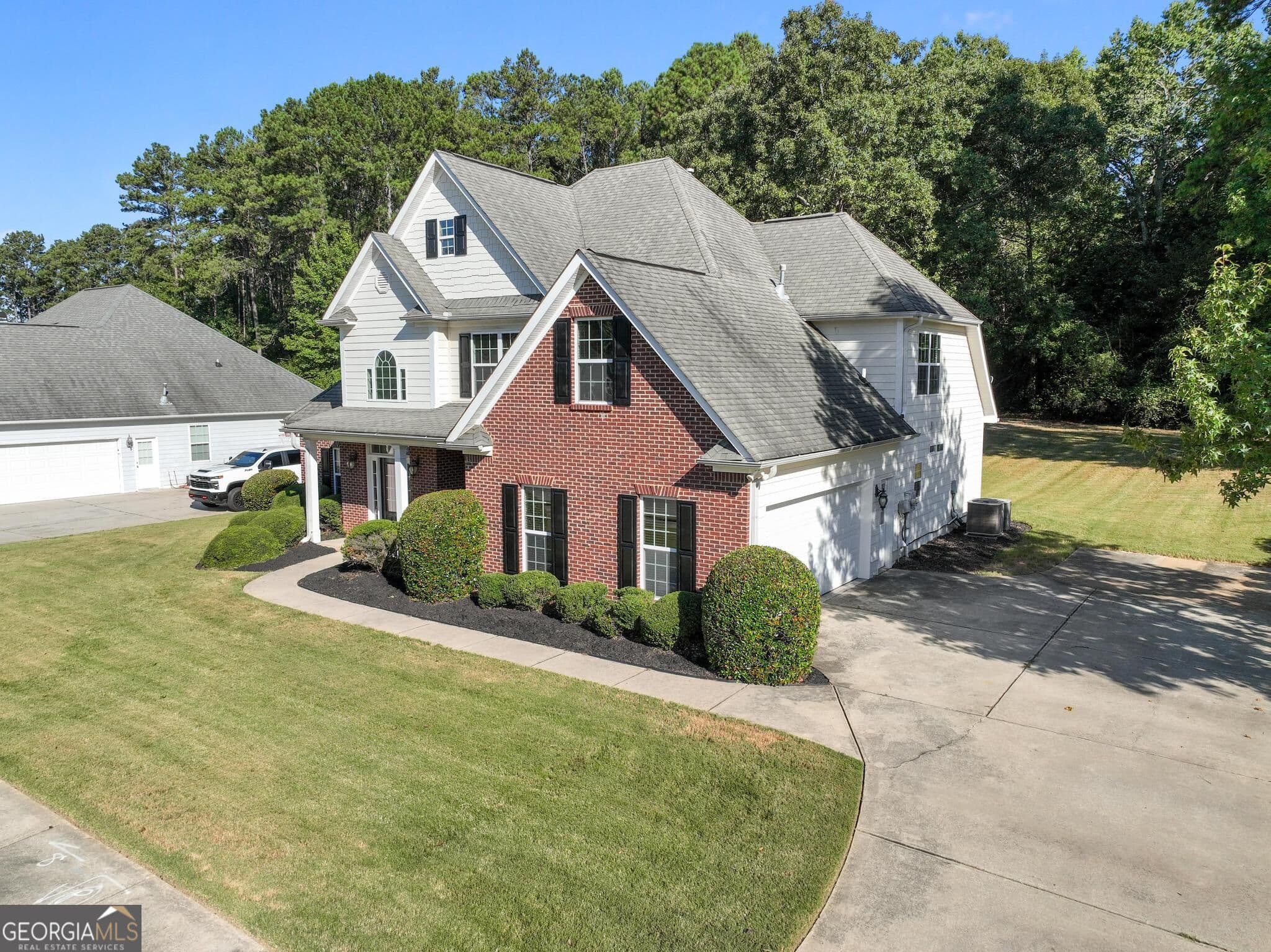 4 bedroom, 3 bathroom, 2,416 sq ft single family residence for sale at 205 Keaton Drive, Fayetteville, GA 30215 — photo 2