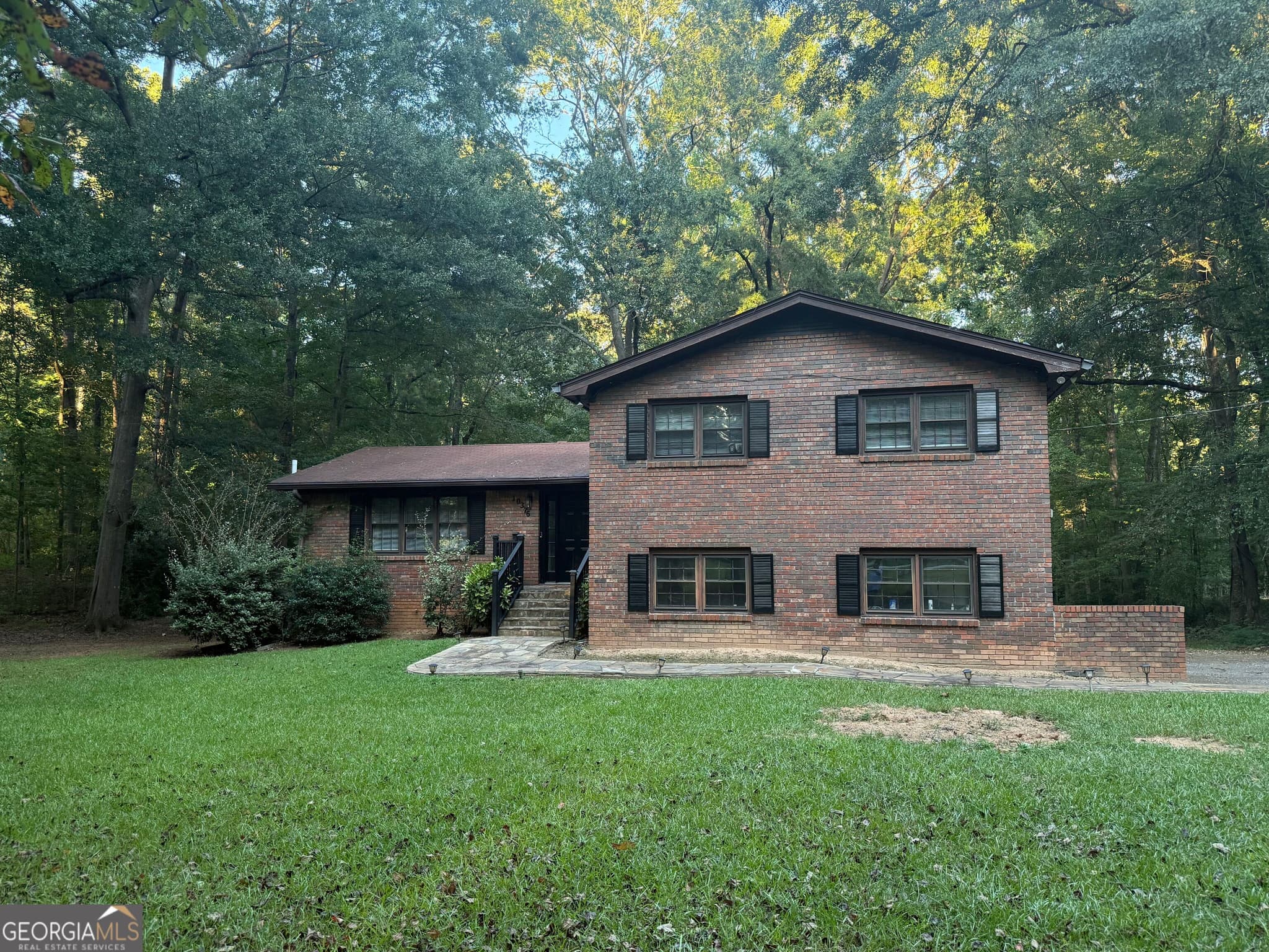 3 bedroom, 2.5 bathroom, 2,846 sq ft single family residence for sale at 10376 Fitzgerald Road, Jonesboro, GA 30238 — photo 1 of 21