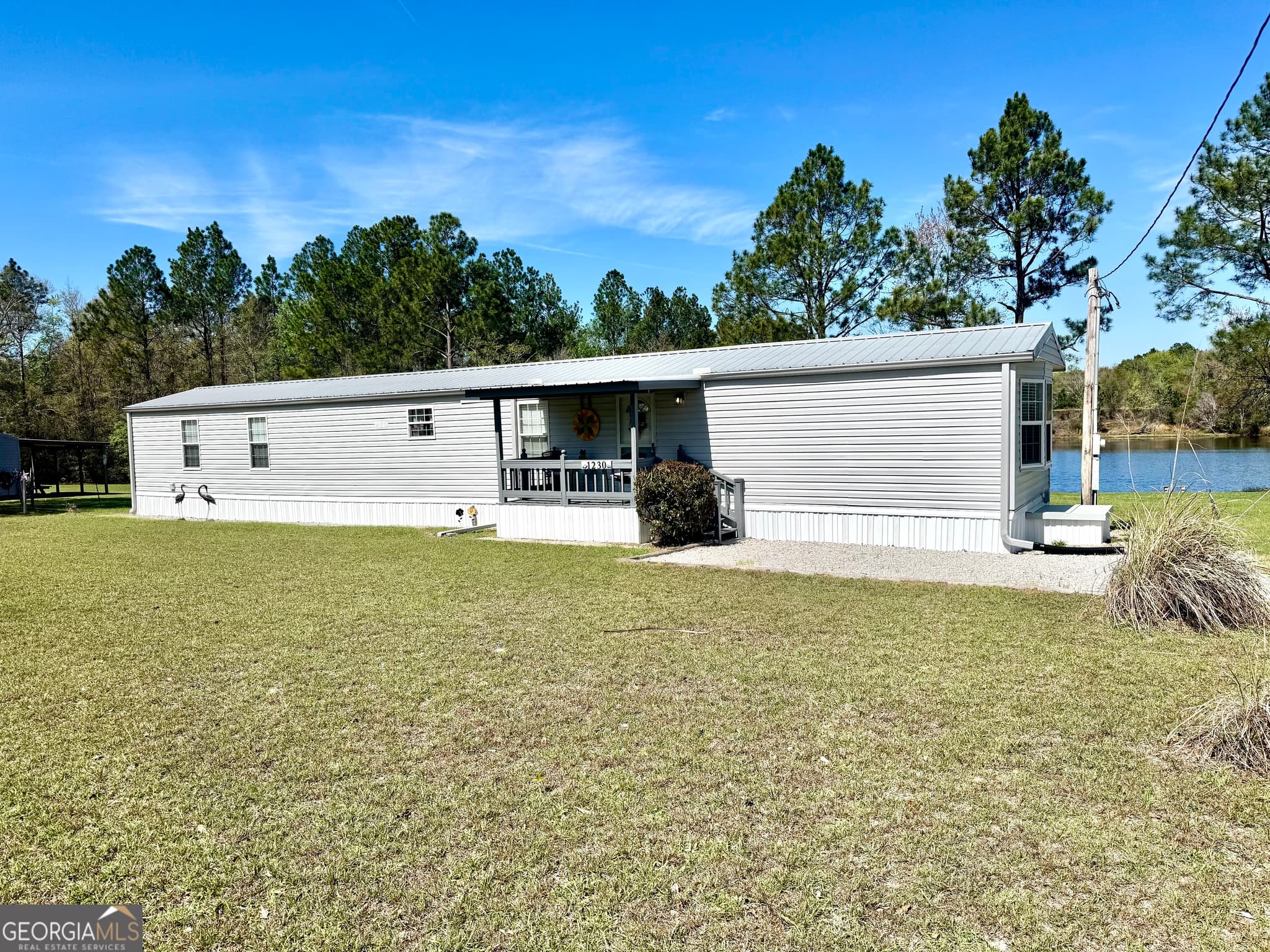 2 bedroom, 2 bathroom, 1,064 sq ft manufactured home,single family residence sold at 1230 Rolling Acres Road, Metter, GA 30439