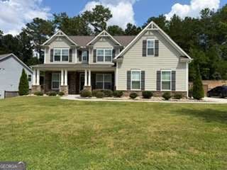 5 bedroom, 4 bathroom single family residence for rent at 2770 Windsor Knoll Drive, Dacula, GA 30019 for $3,800 a month — photo 1 of 19