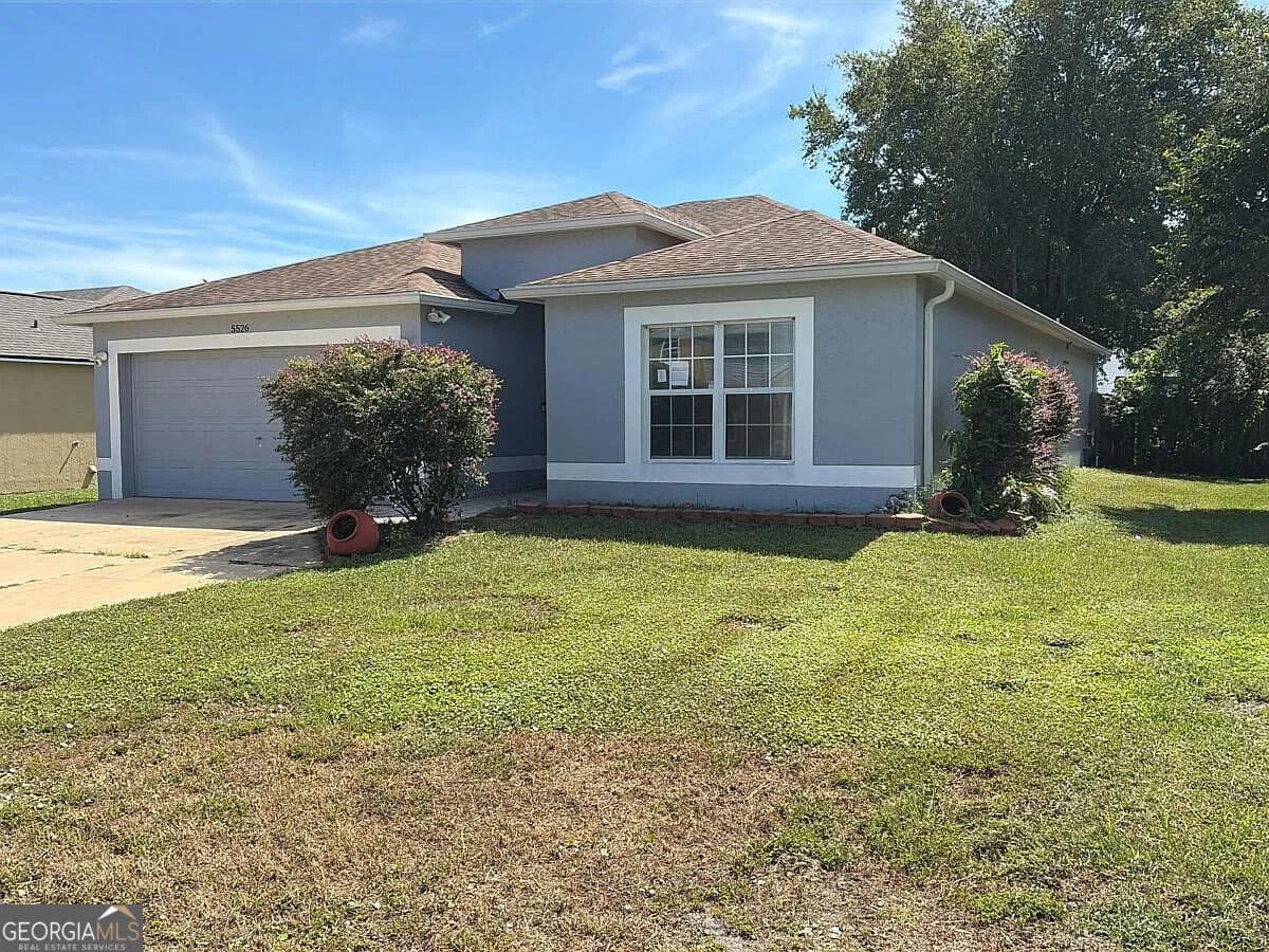 4 bedroom, 2 bathroom, 1,874 sq ft single family residence for sale at 5526 Ortega Park Boulevard, Jacksonville, FL 32244 — photo 2