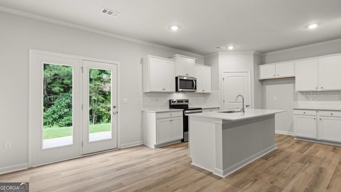 3 bedroom, 2.5 bathroom, 1,877 sq ft townhouse for sale at 6521 Parsons Street, Flowery Branch, GA 30542 — photo 6