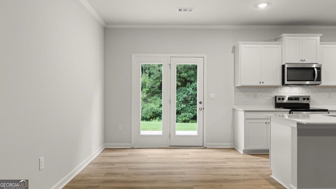 3 bedroom, 2.5 bathroom, 1,877 sq ft townhouse for sale at 6521 Parsons Street, Flowery Branch, GA 30542 — photo 10