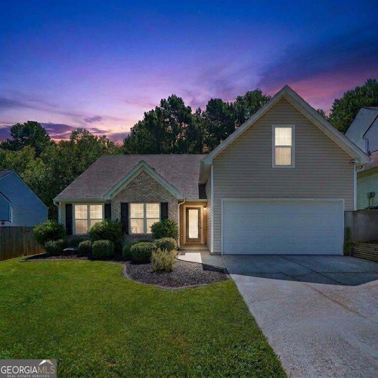 4 bedroom, 2 bathroom, 1,639 sq ft single family residence for sale at 1077 Woodsong Pass Court, Lawrenceville, GA 30043