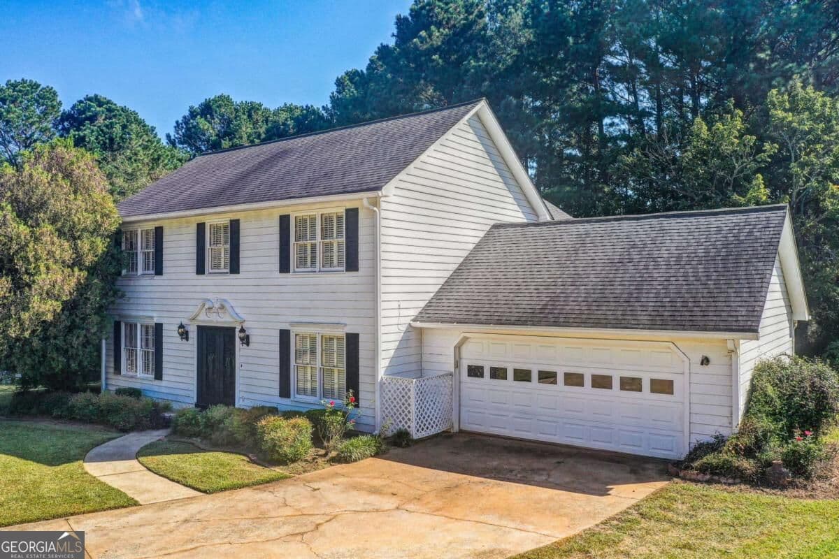 4 bedroom, 2.5 bathroom, 2,216 sq ft single family residence for sale at 7684 Highland Park Drive, Jonesboro, GA 30236 — photo 2