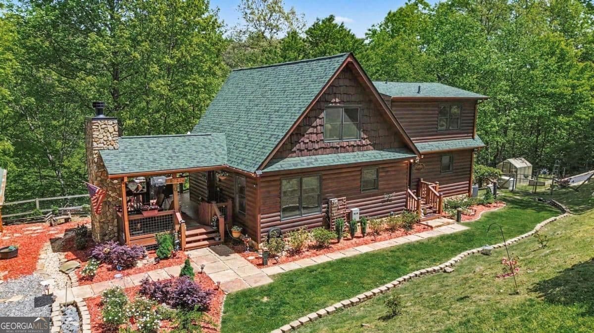 3 bedroom, 3.5 bathroom, 3,313 sq ft cabin,single family residence for sale at 710 Ensley Road, Epworth, GA 30541 — photo 2
