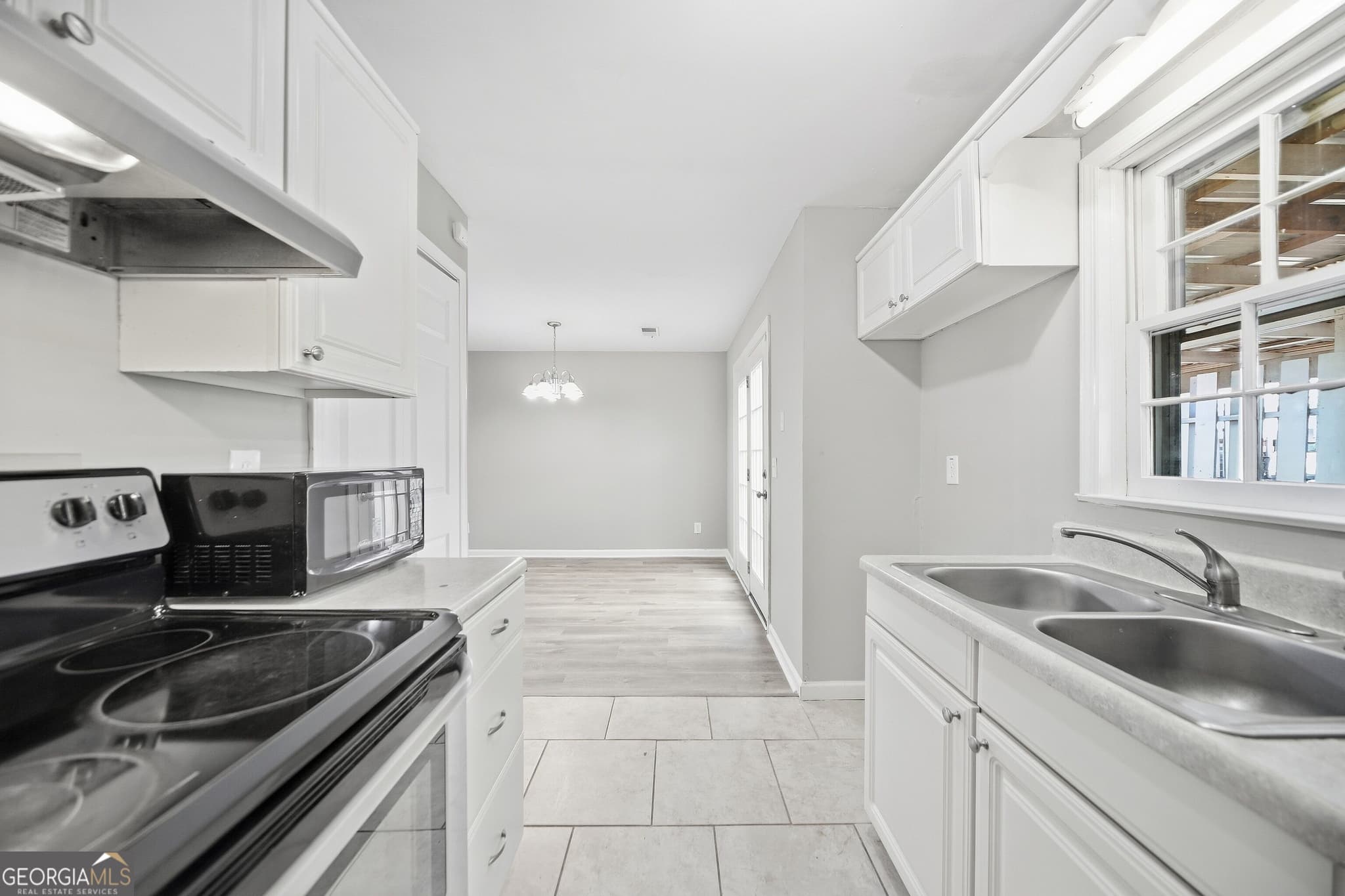 1 bedroom, 1.5 bathroom, 1,240 sq ft townhouse for sale at 992 Old Holcomb Bridge Road, Roswell, GA 30076 — photo 9