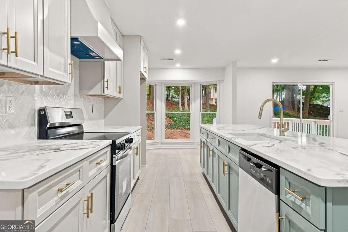 4 bedroom, 3 bathroom, 1,716 sq ft single family residence for sale at 645 Noell Way, Lilburn, GA 30047 — photo 7
