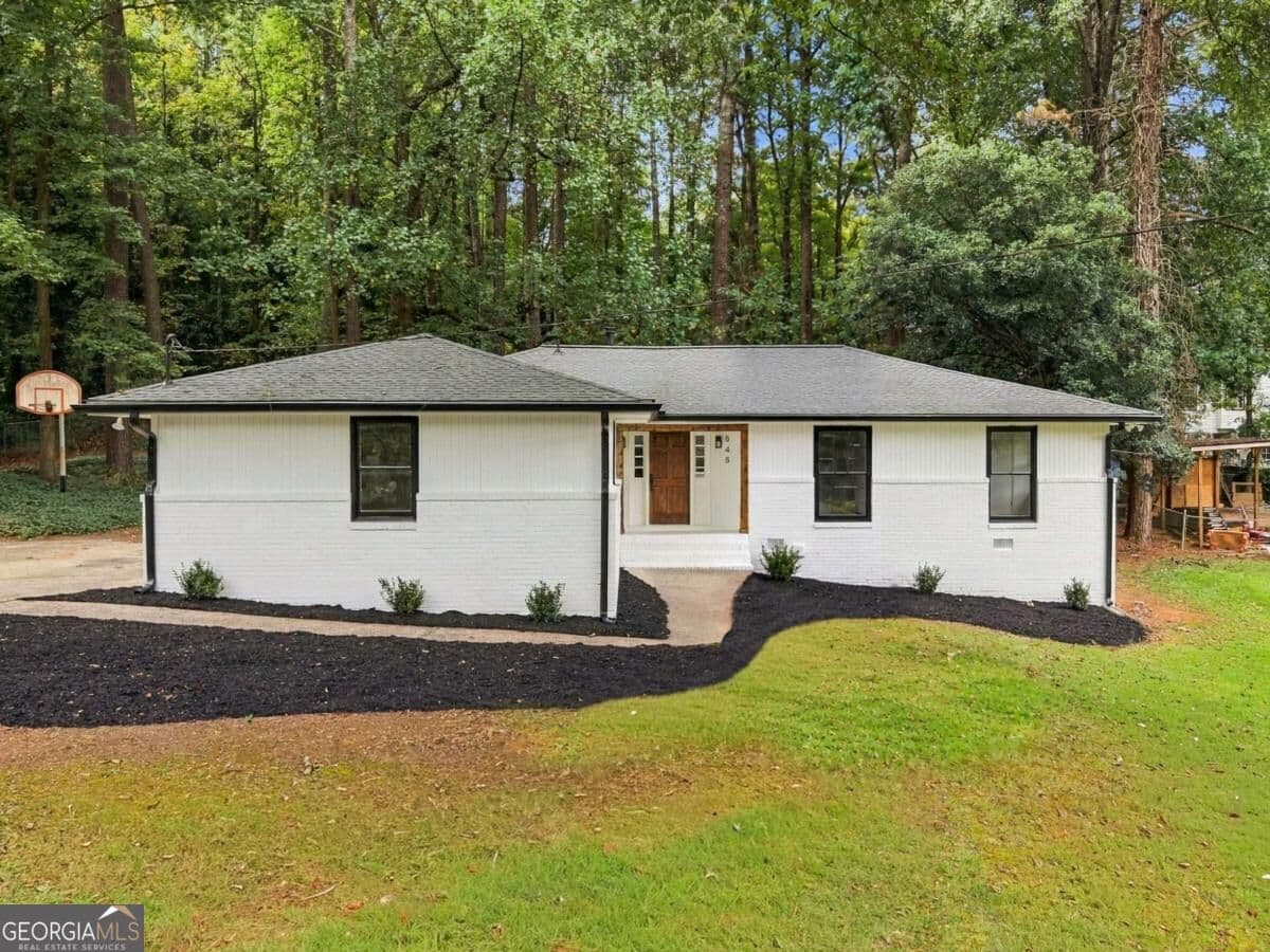 4 bedroom, 3 bathroom, 1,716 sq ft single family residence for sale at 645 Noell Way, Lilburn, GA 30047