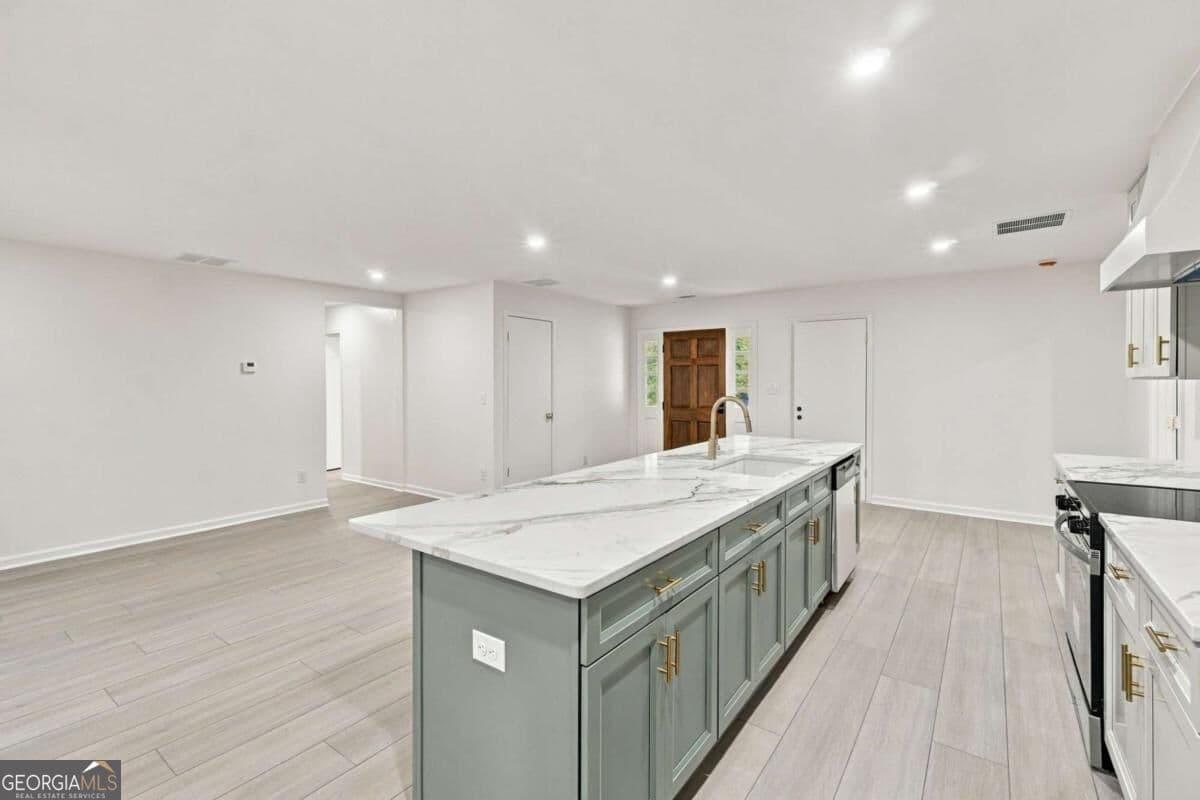 4 bedroom, 3 bathroom, 1,716 sq ft single family residence for sale at 645 Noell Way, Lilburn, GA 30047 — photo 10