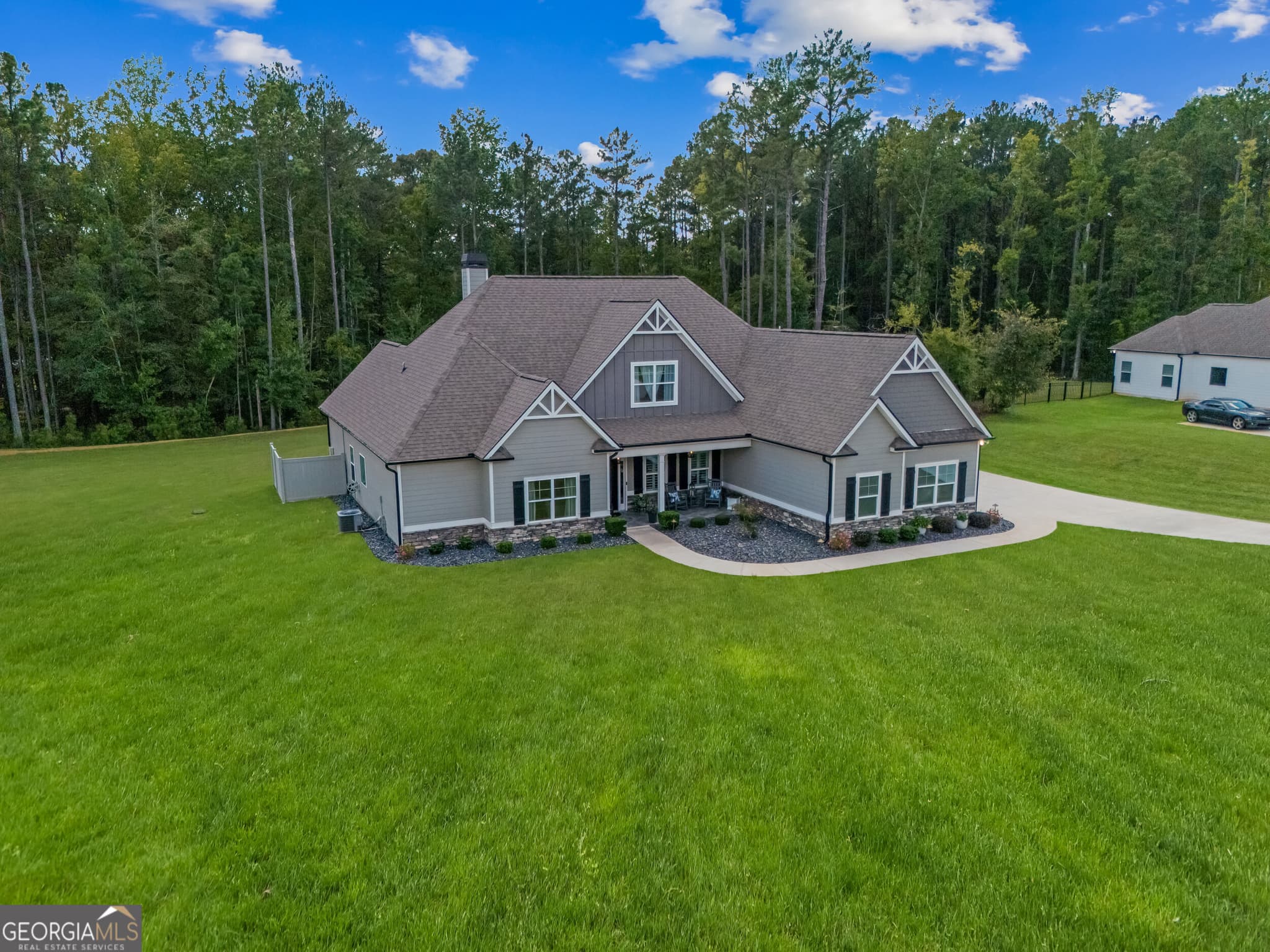 5 bedroom, 5.5 bathroom, 3,690 sq ft single family residence for sale at 82 Riverstone Drive, Senoia, GA 30276 — photo 3
