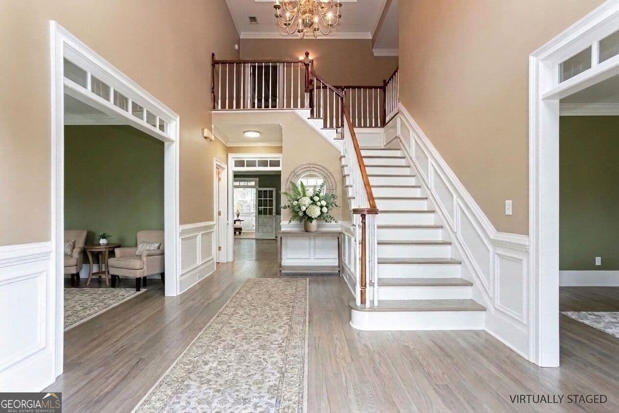 5 bedroom, 4.5 bathroom, 6,778 sq ft single family residence for sale at 2651 Brentford Lane, Snellville, GA 30078 — photo 3