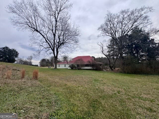 4 bedroom, 2 bathroom, 2,480 sq ft single family residence for sale at 4600 Mahan Road, Summerville, GA 30747 — photo 3