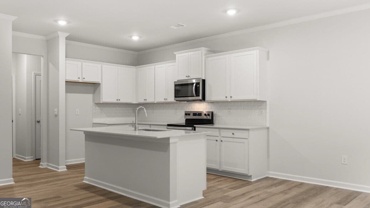 3 bedroom, 2.5 bathroom, 1,857 sq ft townhouse for sale at 6525 Parsons Street, Flowery Branch, GA 30542 — photo 5