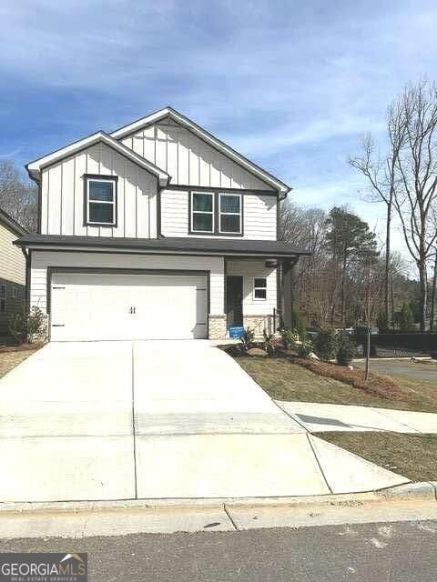 5 bedroom, 3 bathroom, 2,420 sq ft single family residence for sale at 104 NESBIT Drive, Holly Springs, GA 30114 — photo 2