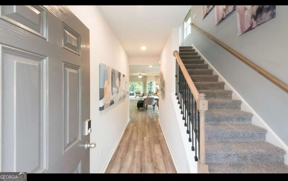 5 bedroom, 3 bathroom, 2,420 sq ft single family residence for sale at 104 NESBIT Drive, Holly Springs, GA 30114 — photo 6