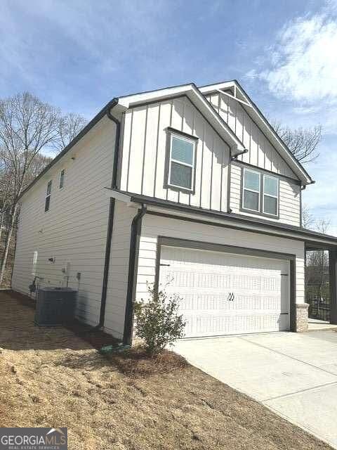 5 bedroom, 3 bathroom, 2,420 sq ft single family residence for sale at 104 NESBIT Drive, Holly Springs, GA 30114 — photo 3