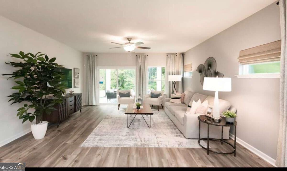 5 bedroom, 3 bathroom, 2,420 sq ft single family residence for sale at 104 NESBIT Drive, Holly Springs, GA 30114 — photo 9