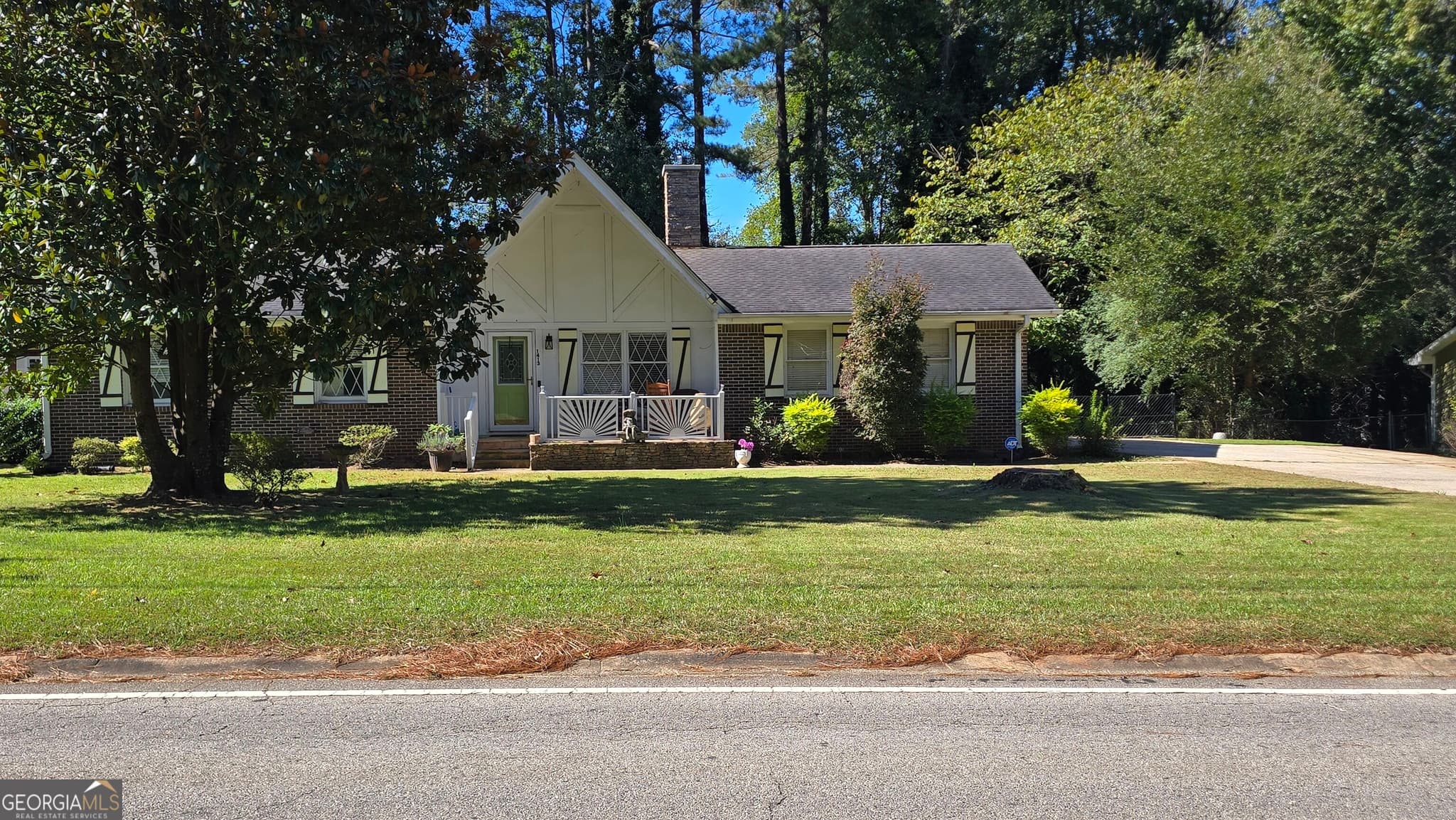 3 bedroom, 2 bathroom, 1,258 sq ft single family residence for sale at 1413 Flat Rock Road, Stockbridge, GA 30281 — photo 1 of 6