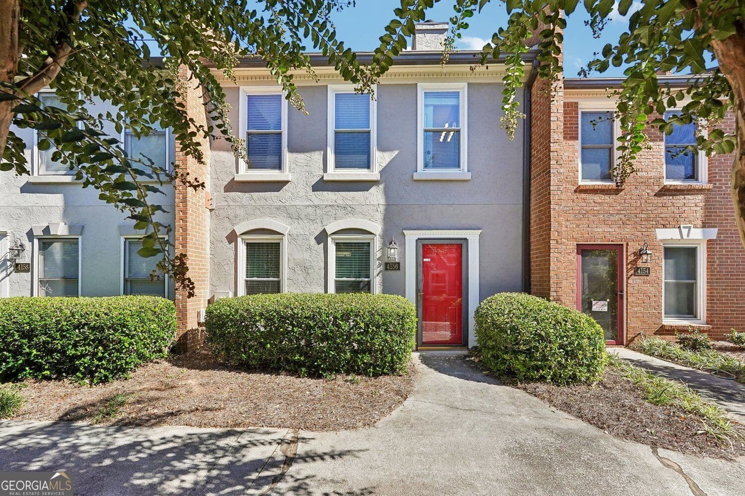 2 bedroom, 2.5 bathroom, 1,280 sq ft townhouse for sale at 4156 Darby Way, Duluth, GA 30096 — photo 1 of 51