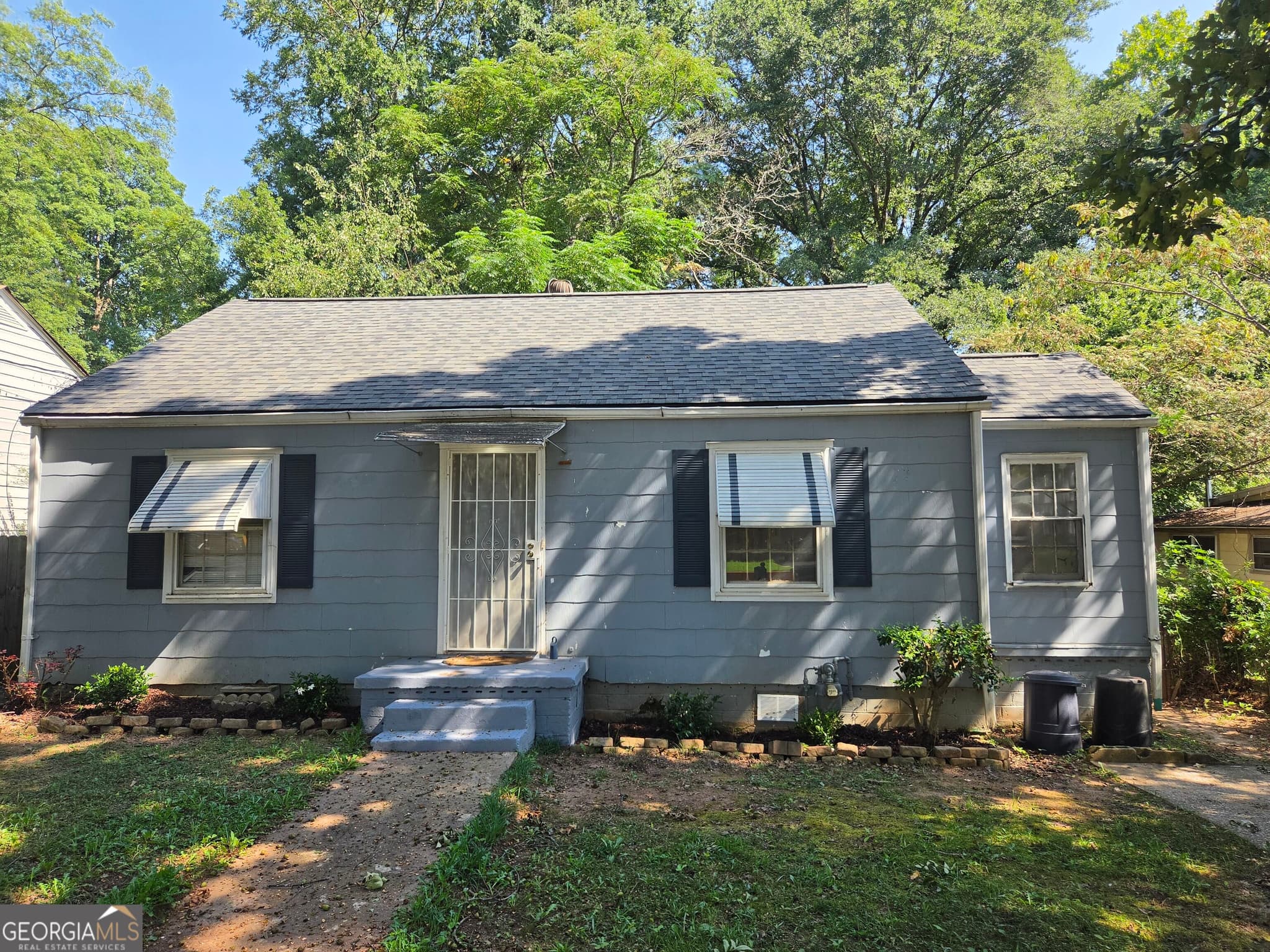 2 bedroom, 1 bathroom, 980 sq ft single family residence for sale at 1693 John Calvin Avenue, College Park, GA 30337 — photo 1 of 17