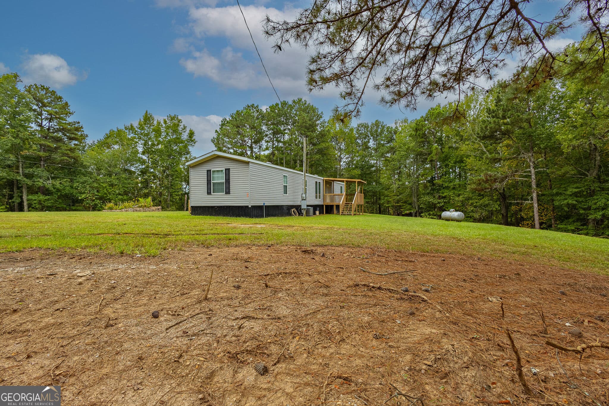 3 bedroom, 2 bathroom, 1,280 sq ft manufactured home,single family residence for sale at 2569 County Road 5, Heflin, AL 36264 — photo 2