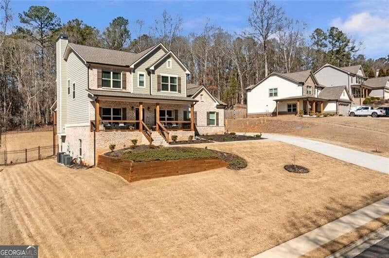 5 bedroom, 4 bathroom, 3,515 sq ft single family residence for sale at 2113 Hope Lane, Monroe, GA 30656 — photo 3
