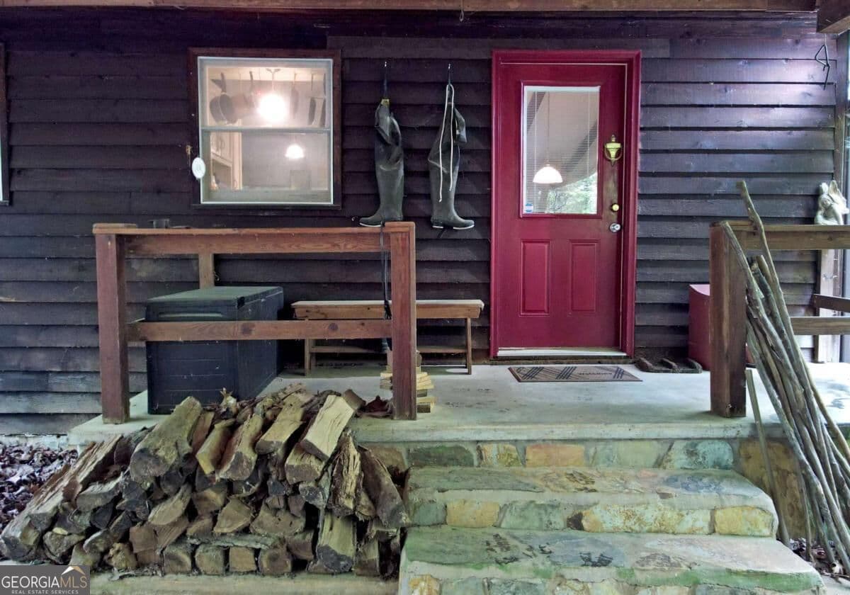 4 bedroom, 3 bathroom, 2,040 sq ft cabin,single family residence for sale at 66 Pine Ridge Court, Ellijay, GA 30536 — photo 2