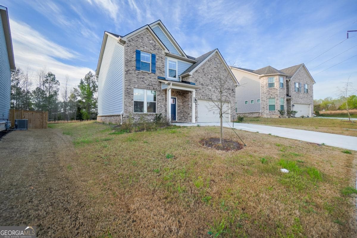 4 bedroom, 2.5 bathroom, 2,278 sq ft single family residence for sale at 2837 Malton Way, Loganville, GA 30052 — photo 3