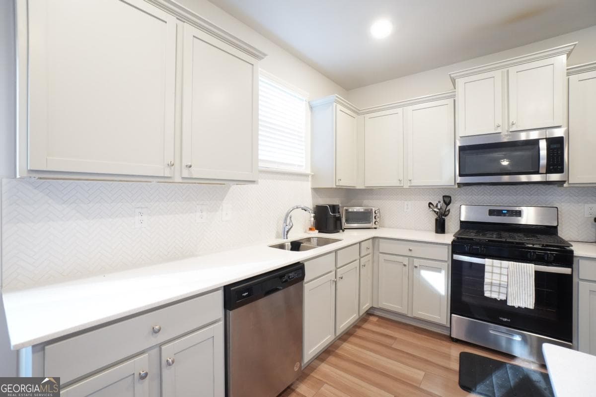 4 bedroom, 2.5 bathroom, 2,278 sq ft single family residence for sale at 2837 Malton Way, Loganville, GA 30052 — photo 9