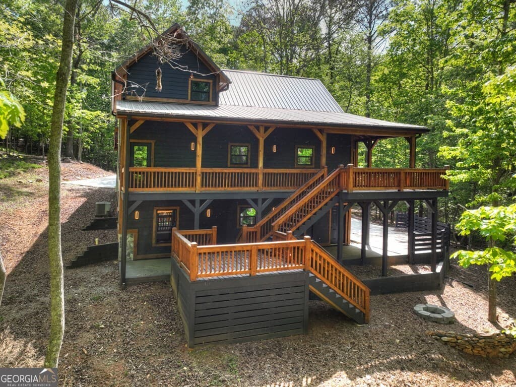 4 bedroom, 3.5 bathroom, 2,831 sq ft cabin,single family residence for sale at 40 Cadet Court, Ellijay, GA 30540 — photo 7
